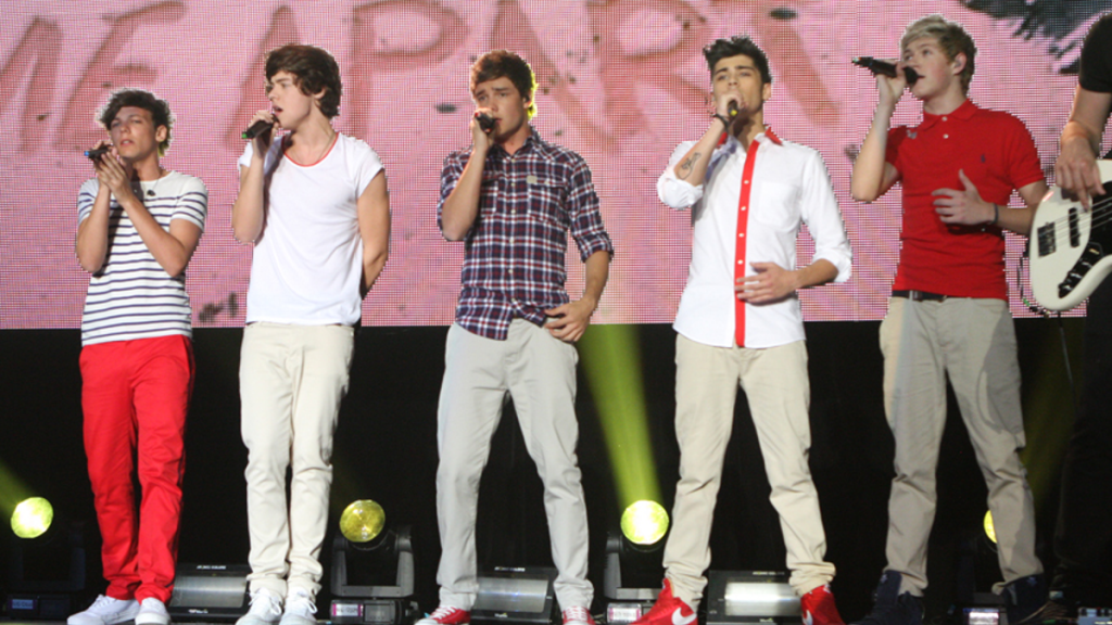 One Direction performing live on stage