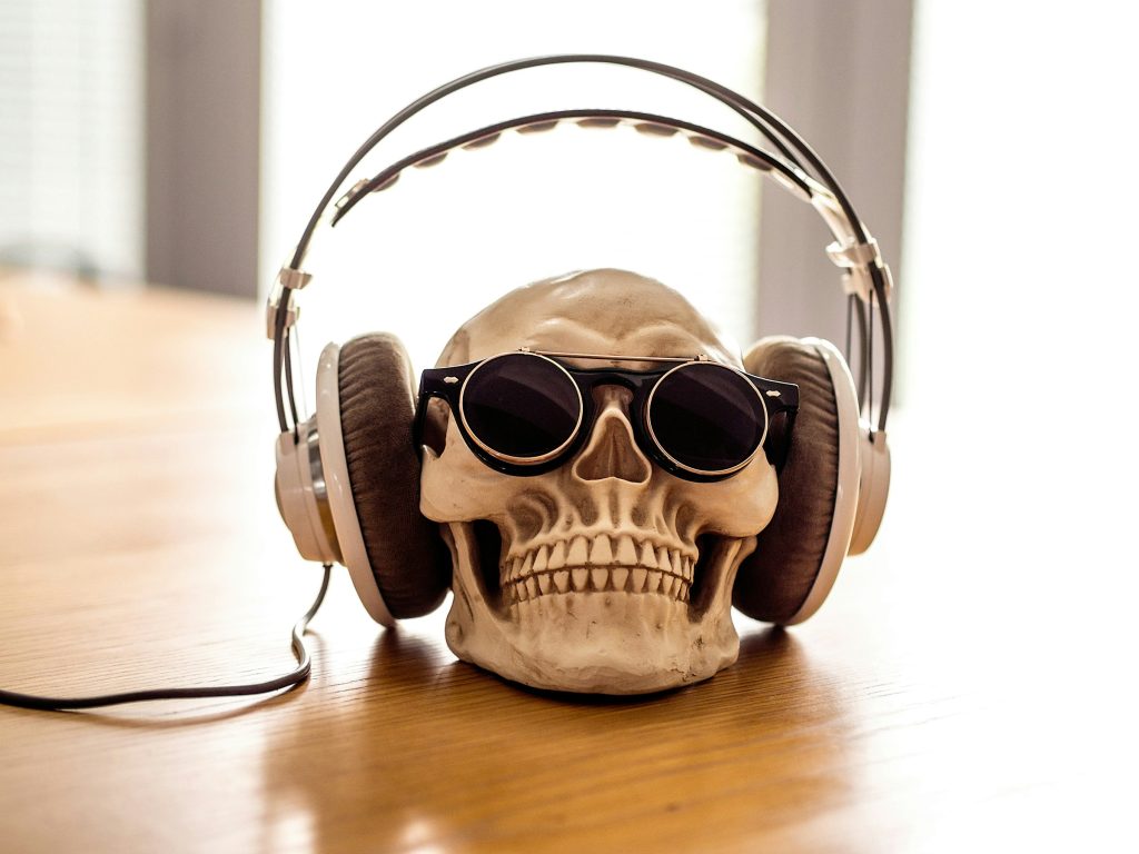 Skull with sunglasses and headphones