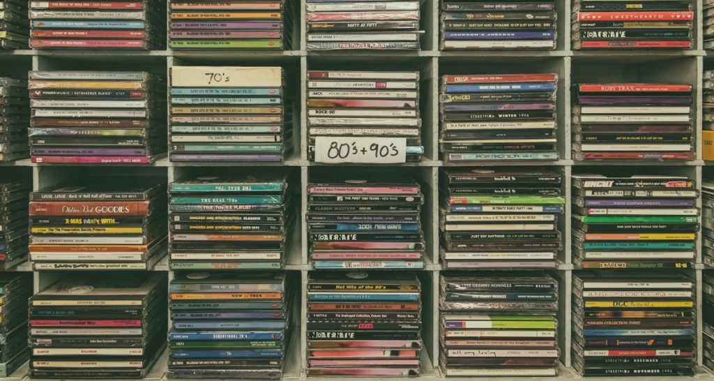 Stacked CDs on retail shelves