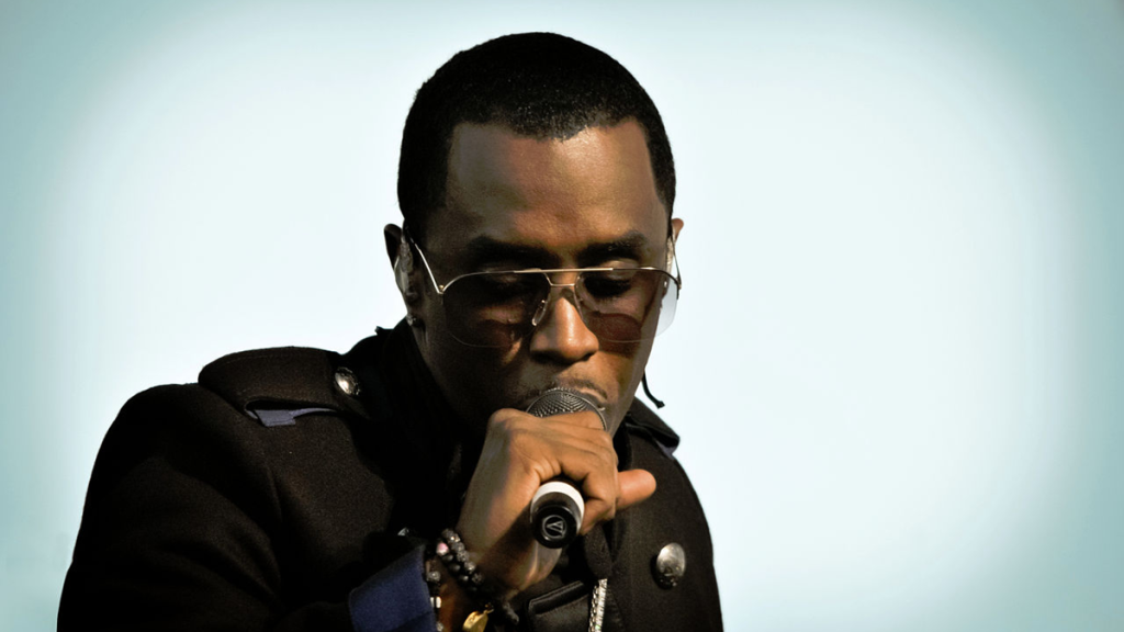 Diddy speaking into microphone closeup