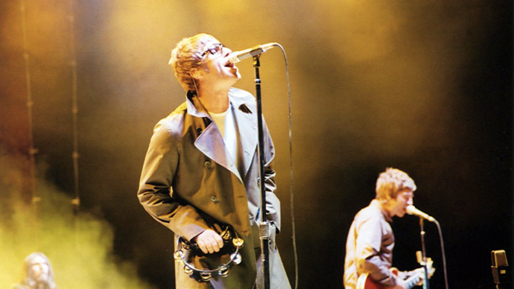 Oasis performing live in concert