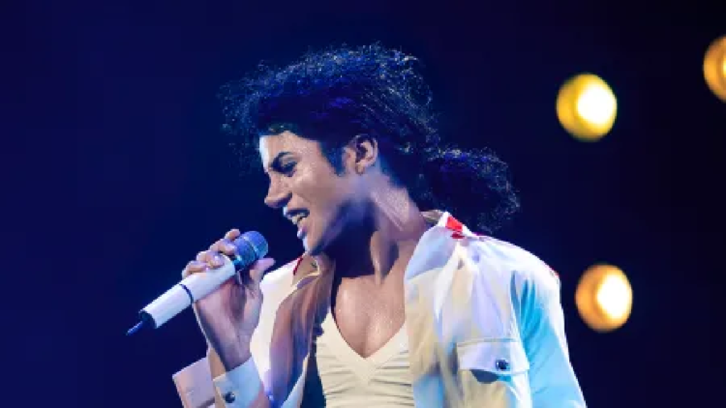 Michael Jackson performing with mic onstage