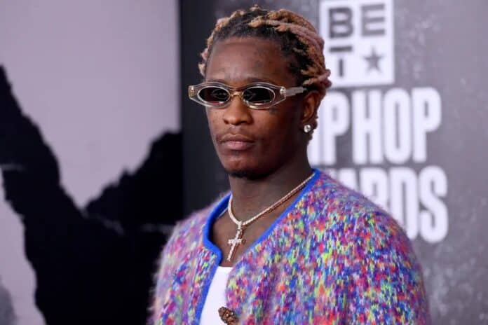 Young Thug wearing dark glasses