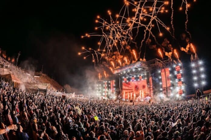 music festival crowd under nighttime lights