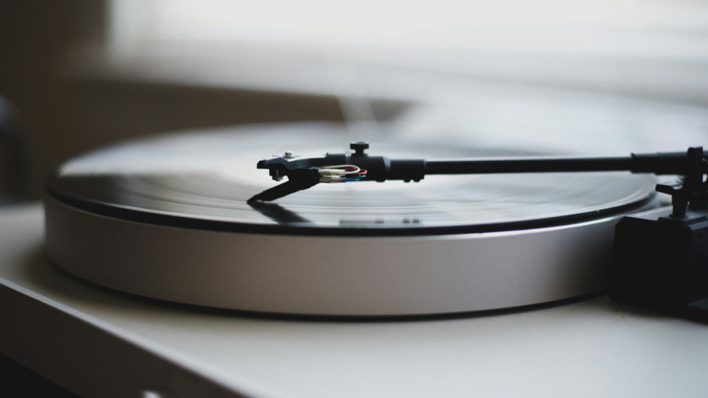 Vinyl record spinning on analog turntable