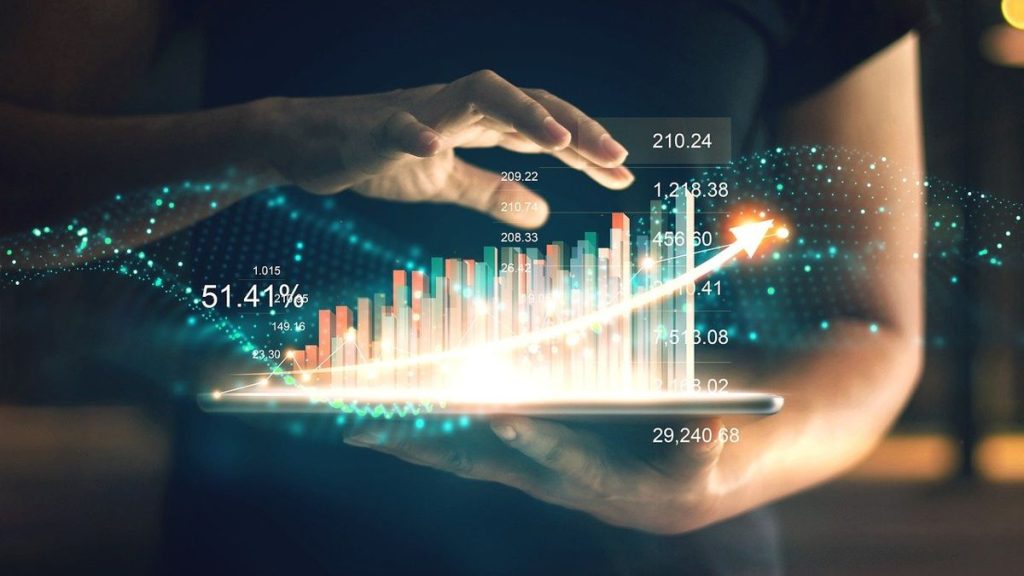 Person viewing analytics on tablet device