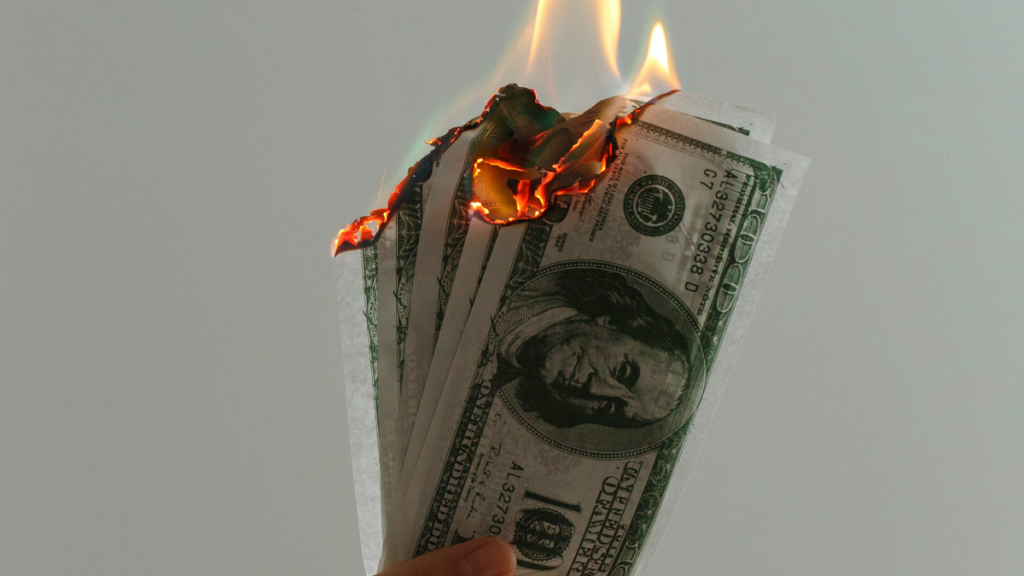 Burning money with royalty fees surcharge