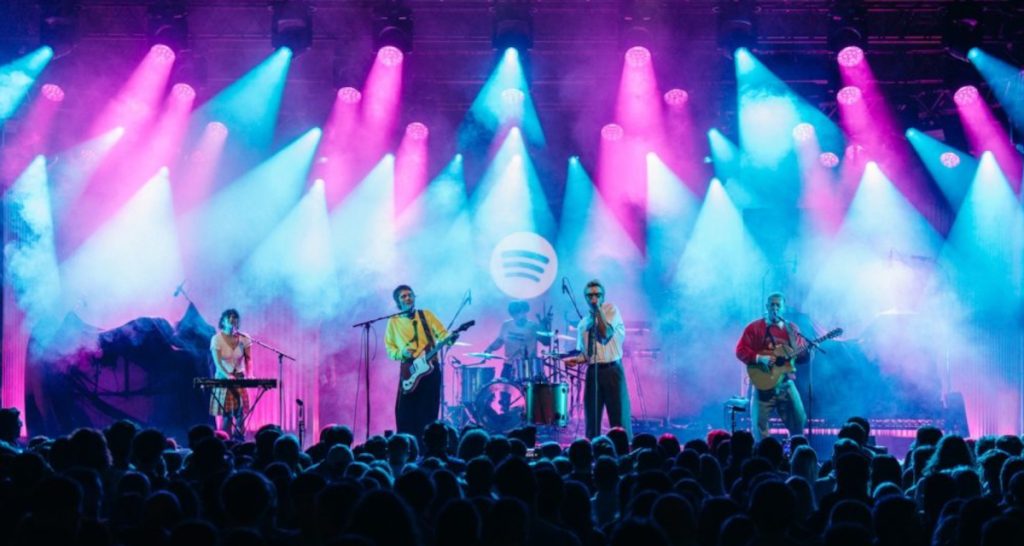 Blossoms band performs on stage