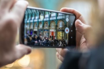 Man filming with smartphone