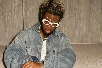 Rapper OG Maco in denim jacket