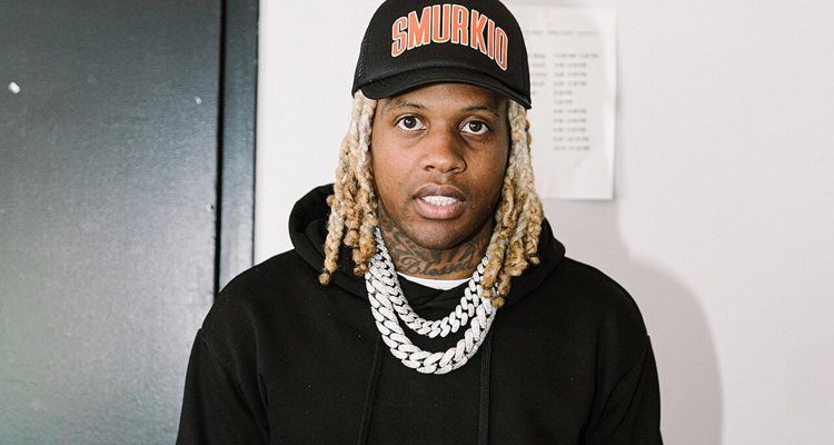 Lil Durk wearing black baseball cap