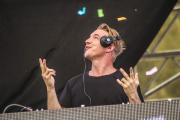 Diplo wearing headphones in black