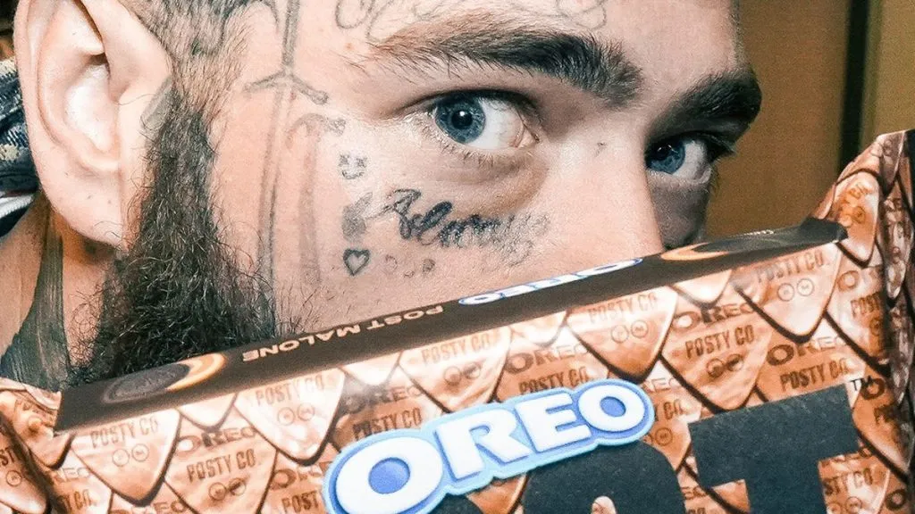 Post Malone eating Oreo cookie