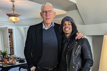 Two men standing at YouTube event