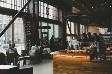 Customers seated in busy cafe