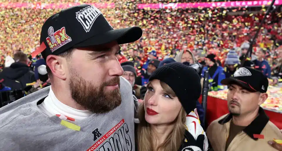 Taylor Swift and Travis Kelce embracing